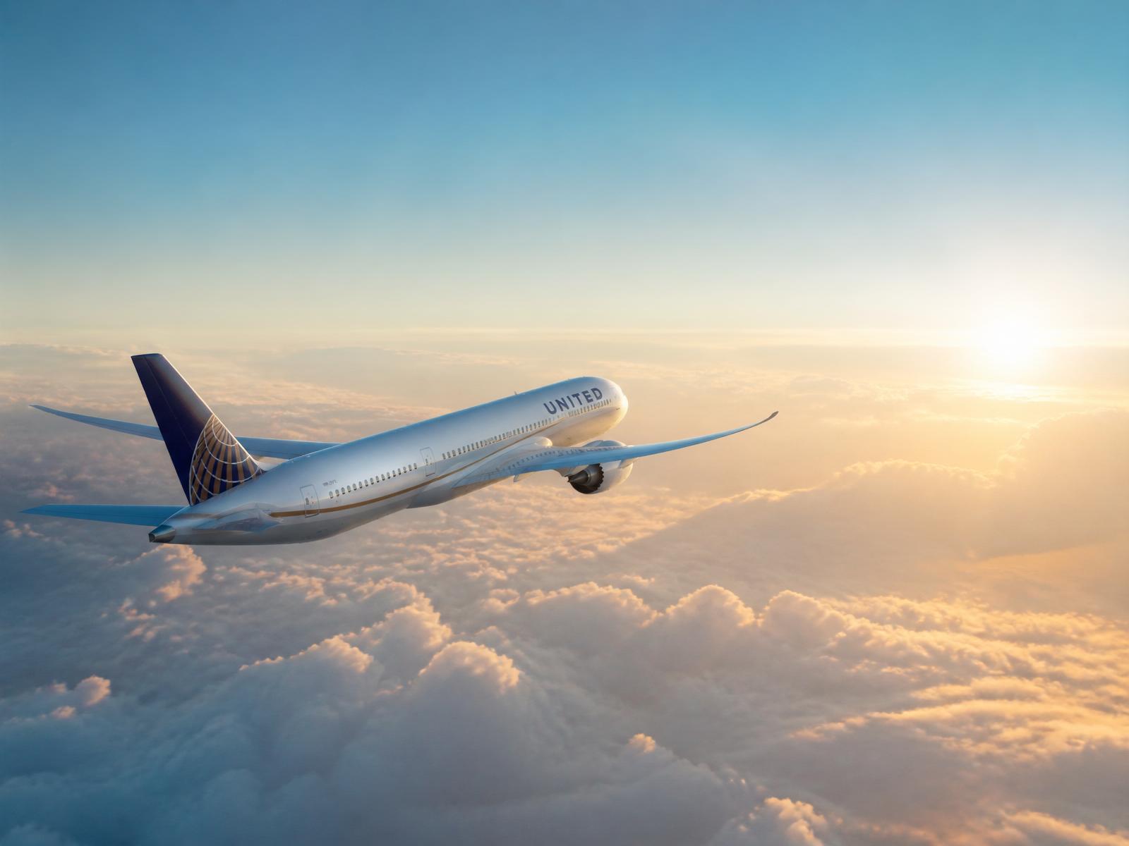 Commercial jet climbing at golden hour